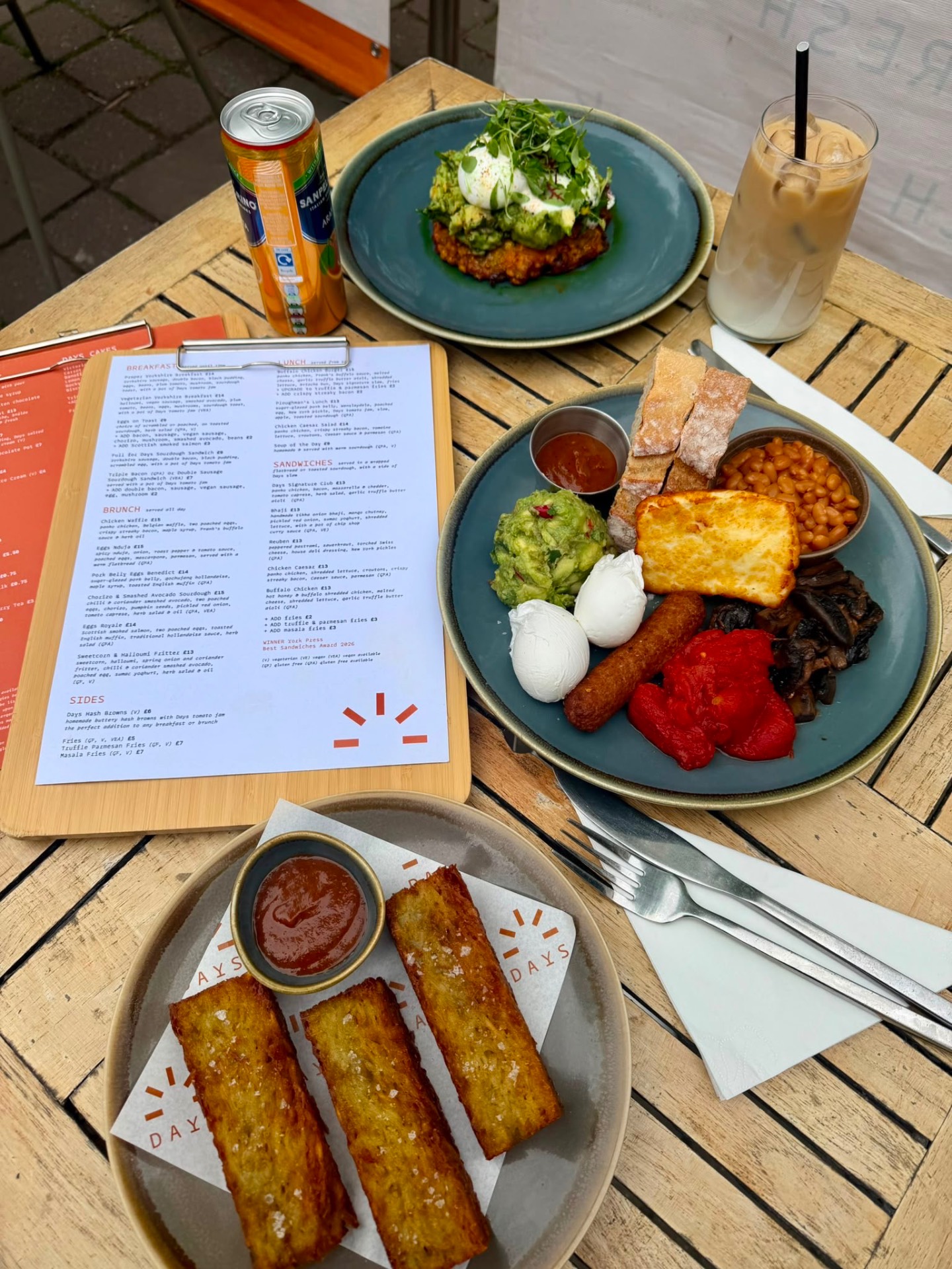 Full Yorkshire breakfast spread with hash browns and sourdough toast